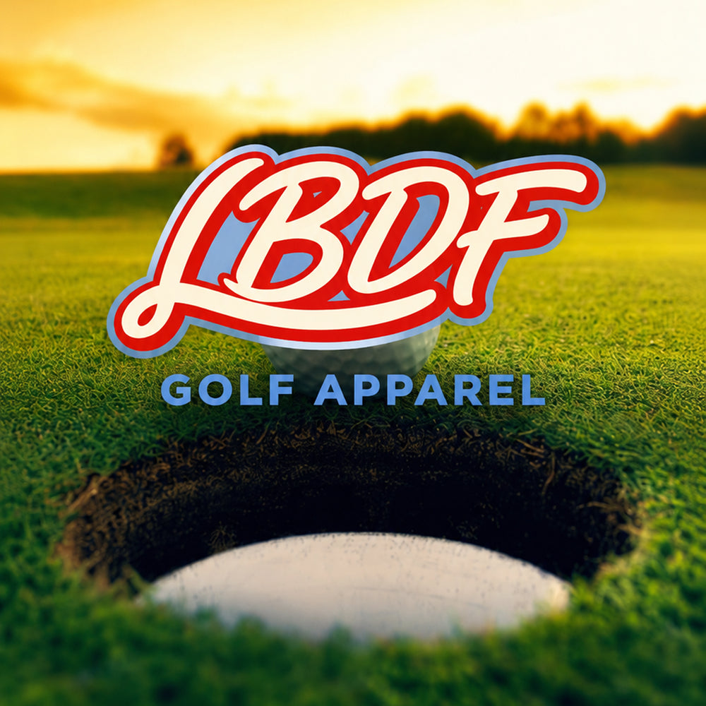 Golf ball on green grass with LBDF Golf Apparel logo overlay